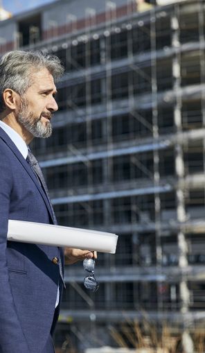 senior-businessman-architect-helmet-construction-s-2026-01-07-07-03-36-utc_small.jpg