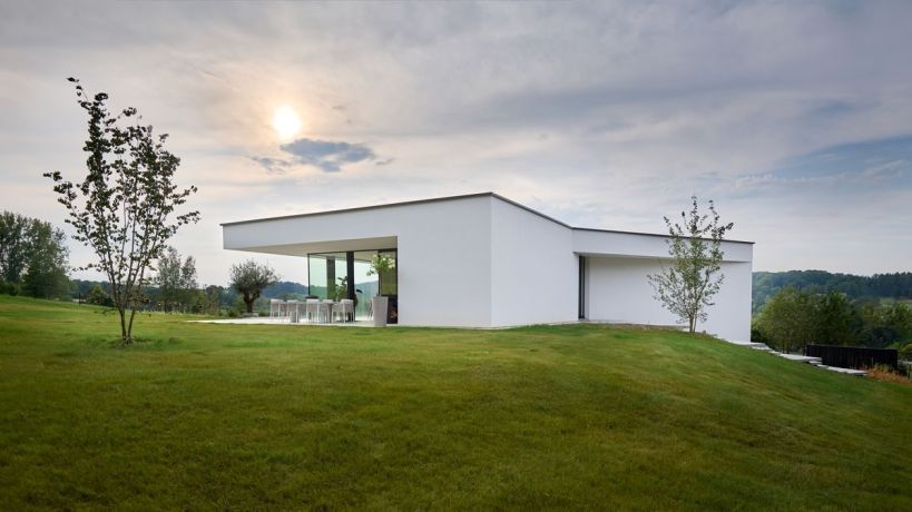 Villa minimaliste toit plat crepi piscine terrain pentu brabant wallon 14