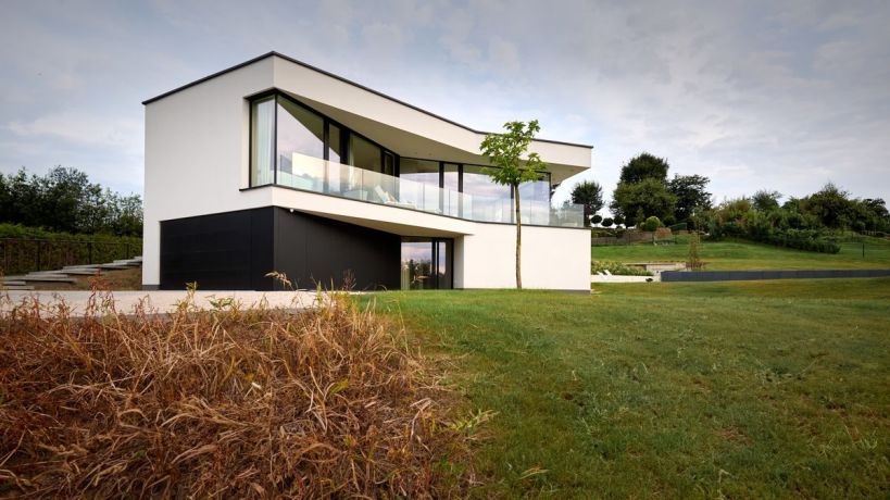 Villa minimaliste toit plat crepi piscine terrain pentu brabant wallon 18