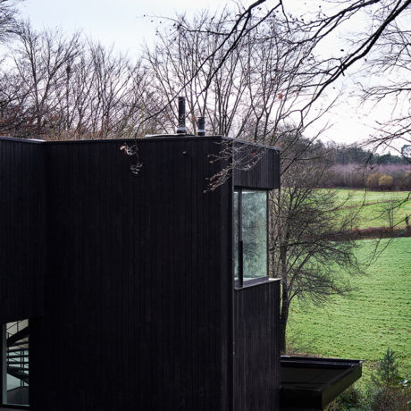 Rehausse bungalow structure bois brule minimaliste toit plat limal wavre